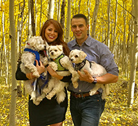Justin Murphy with his wife and dogs