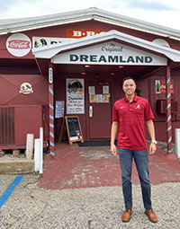 Kevin Quan outside Dreamland BBQ
