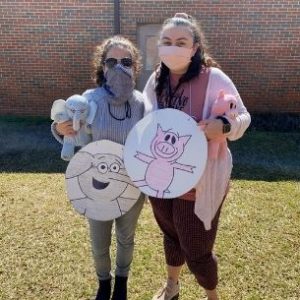 Katie and one other teacher dressed up as a pig and an elephant