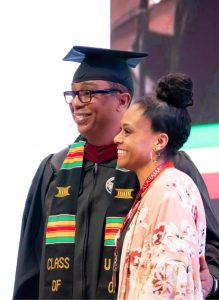 Jay and his wife at graduation